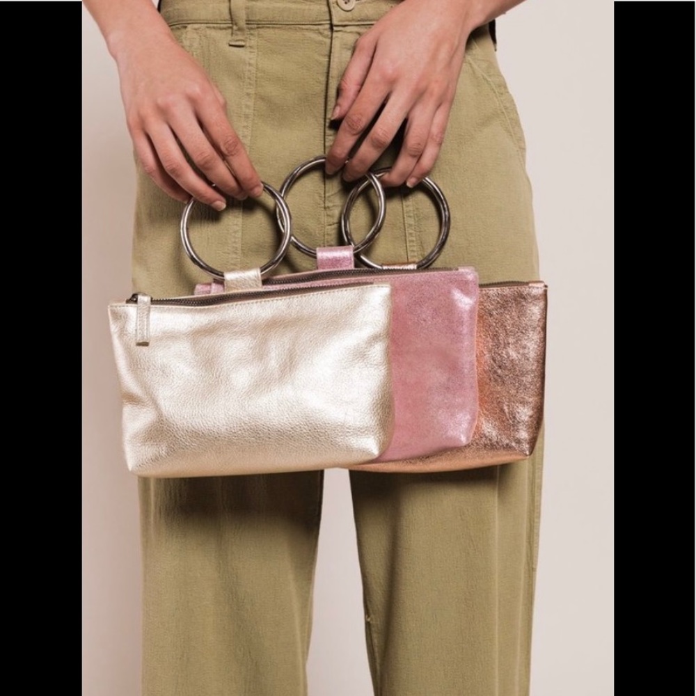 NWT. Kim White 3 Ring Wristlet